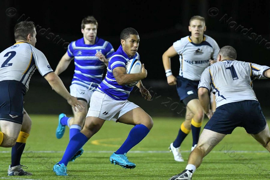 Wheaton Men\'s Rugby vs Mass Maritime.  Photo by Keith Nordstrom